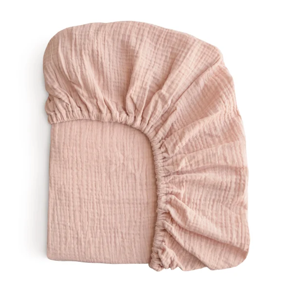 Blush_Crib_Sheet_folded.webp